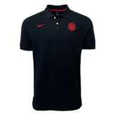 Just In: The Stade Toulousain Pique Polo by Nike featuring a red Nike logo and a red embroidered crest on the chest, available in black.