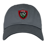 A grey RC Toulon Heritage 86 Cap by Nike, featuring a red and green badge adorned with white flowers and the text "TOULON RCT" on the front, perfect for Rugby Club Toulonnais fans.