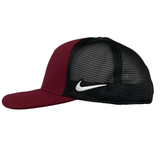 A side view of a maroon and black RC Toulon C99 Trucker Cap by Nike with a white logo on the back panel, featuring Dry-Fit technology for ultimate comfort.