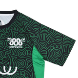 The Las Serpientes Mexico Rugby Training Jersey by Credo Rugby features green and black geometric swirl patterns, "SERPIENTES" text, and two snake graphics on the left chest—ideal for Credo Rugby fans.
