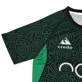 The Las Serpientes Mexico Rugby Training Jersey by Credo Rugby features geometric black and green patterns, a mountain logo and "credo" on the chest, plus green mesh side panels—ideal for Credo Rugby fans.
