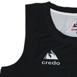 Close-up of the Las Serpientes Mexico Rugby Tank Top by Credo Rugby, a black athletic tank featuring a white mountain logo and "credo" on the chest—ideal for Credo Rugby fans or those wanting this stylish branded rugby wear.