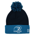The Leinster Bobble Beanie 24/25 by Castore is a navy and blue hat with a pom-pom, embroidered crest, and text on the folded brim—an official accessory for true fans.