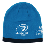 The Leinster 24/25 Beanie by Castore is a blue hat featuring the rugby team's logo, a detail from the Bank of Ireland logo, and a black bottom band—an ideal accessory for Leinster rugby fans.
