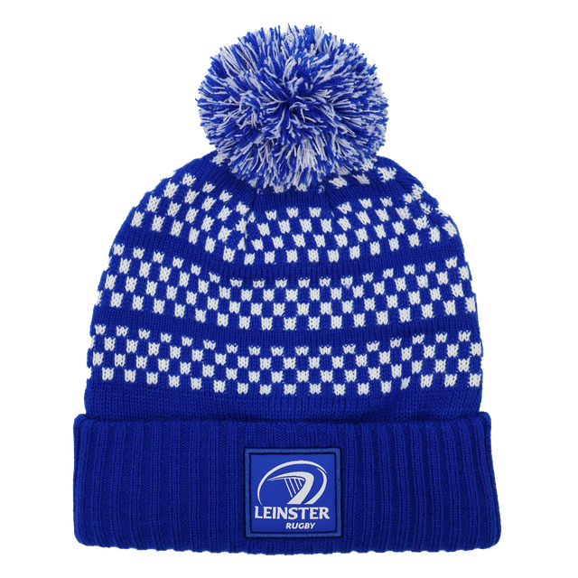 The Leinster Knitted Bobble Hat 24/25 by Castore is a blue and white beanie with a pom-pom and features a "Leinster Rugby" logo patch on the folded brim.
