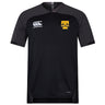 The EMB Canterbury Tacoma Tsunami Rugby Vapodri Evader Jersey is black, features moisture-wicking technology, a yellow "Tacoma Rugby" logo on the left chest, and a white Canterbury logo on the right.