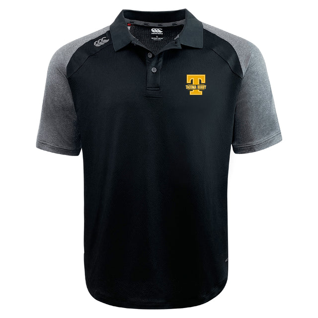 The Tacoma Tsunami Rugby Elite Polo by EMB Canterbury is a black and gray short-sleeve polo with a yellow "T" logo and "TIGAWA RUGBY" on the chest, made from Vapodri fabrics for lightweight comfort.