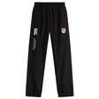 The University of Tennessee Cuffed Hem Stadium Pant by EMB Canterbury features an elastic waistband and cuffs, a white Canterbury logo, and a multicolor badge for sporty style and comfort. Perfect for sport or leisure.