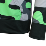 Close-up of the CANTERBURY MID-LAYER SUBLIMATE HOODIE - MENS by Teamatical shows a jacket sleeve and pocket in green, gray, and black camo style with "THERMOREG" printed near the pocket seam.