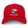 The Sharks Retro Trucker Cap by EMB S&S Activewear features a cartoon shark over "THE SHARKS" on the front, red and white panels, an adjustable snapback closure, and is made to order for a custom fit.
