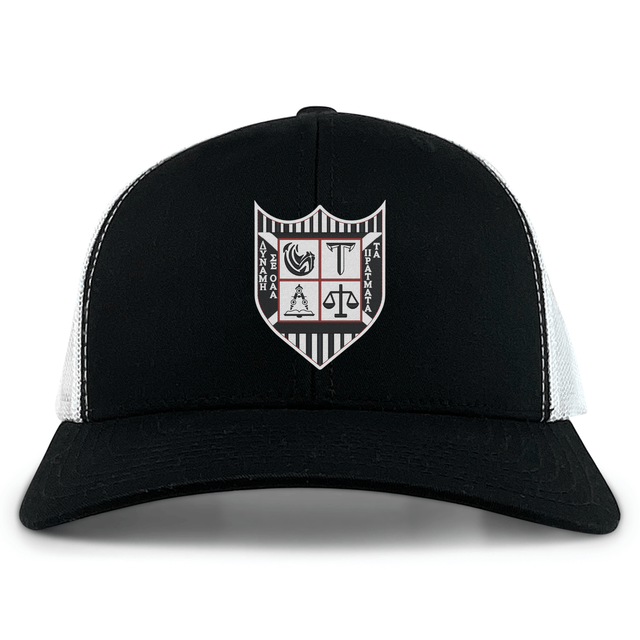 The Troy University Rugby Retro Trucker Cap by EMB S&S Activewear is a black and white cap with an embroidered crest on the front and a snapback closure for adjustable comfort.