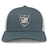 The Troy University Rugby Retro Trucker Cap by EMB S&S Activewear features a gray and white design with an embroidered black and white shield emblem on the front and a classic snapback closure for adjustable fit.