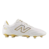 The New Balance 442 Elite FG v3 in Sea Salt/Gold Metallic features gold accents and studs, the signature logo, and DynamicTouch Tech for control and comfort—ideal firm ground soccer cleats from New Balance.