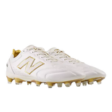 The New Balance 442 Elite FG v3 in Sea Salt/Gold Metallic features a premium microfiber upper and laces, designed for top performance on firm ground soccer surfaces.