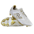 A pair of New Balance 442 Elite FG v3 soccer cleats in Sea Salt/Gold Metallic, one upright and one on its side, showcase DynamicTouch Tech for superior control and gold-accented firm ground studs.