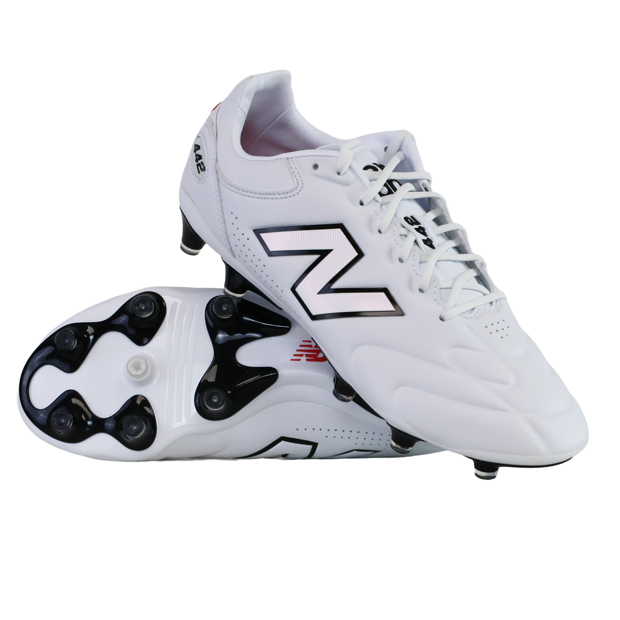 A pair of New Balance Wide 442 Elite FG v3 soccer cleats in white/black—one upright and one showing the sole and studs—offer wide-fit comfort and reliable firm ground performance for players.