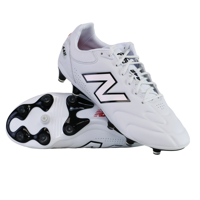 A pair of New Balance Wide 442 Elite FG v3 soccer cleats in white/black—one upright and one showing the sole and studs—offer wide-fit comfort and reliable firm ground performance for players.