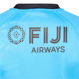 Back of the blue Fiji 25/26 Replica Away Jersey by Umbro featuring a black "FIJI AIRWAYS" logo and a circular geometric motif inspired by Fijian masi art on the left.