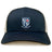 The University of Mary Washington Retro Trucker Cap by EMB Alpha Broder is a dark blue and white cap with a crest logo on the front that reads "UMW RFC" and "1977," featuring the text "Dula Tacta Dura Vita" along with an embroidered design. It comes complete with a snapback closure for adjustable fit.
