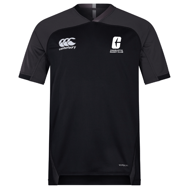 The UNC Charlotte Vapodri Evader Jersey by EMB Canterbury is a black rugby jersey with short sleeves, featuring the Canterbury logo on the left chest and a rugby club logo on the right. This jersey incorporates moisture-wicking technology for optimal performance on the field.