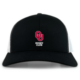 The University of Oklahoma Women Retro Trucker Cap by EMB S&S Activewear features a black and white design with an embroidered red "OU" logo above "Rugby Club" on the front and a classic snapback closure.