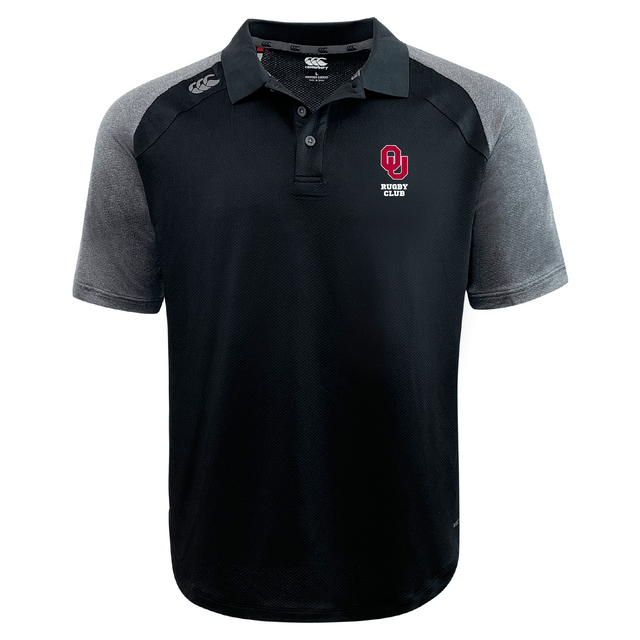 The University of Oklahoma Women Elite Polo by EMB Canterbury is crafted with lightweight, durable Vapodri fabrics, featuring gray sleeves and a prominent red "OU Rugby Club" logo on the chest.