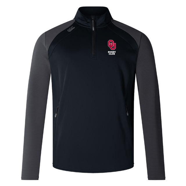 The University of Oklahoma Women Elite 1/4 Zip Top by EMB Canterbury is a black and gray long-sleeve performance pullover with a zip-up collar, featuring an "OU" logo and "Rugby Club" text on the chest, blending comfort and style.