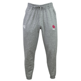 University of Oklahoma Women Leisure Sweatpant by EMB Canterbury in gray, made with organic cotton and a drawstring waist, featuring a white logo on the left thigh and a red logo on the right thigh.