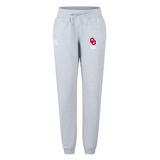 The University of Oklahoma Women's Leisure Sweatpant by EMB Canterbury features a drawstring waist, iconic "OU" logo on the left thigh, and is made from soft organic cotton. These gray sweatpants offer comfort and style.