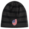 The EMB Canterbury USA Shield Beanie sports a dark striped pattern with an American flag shield emblem prominently on the front.