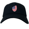 The USA Shield Flex Drill Cap by EMB Canterbury is a stylish black baseball cap featuring an American flag-shaped USA Shield patch on the front.