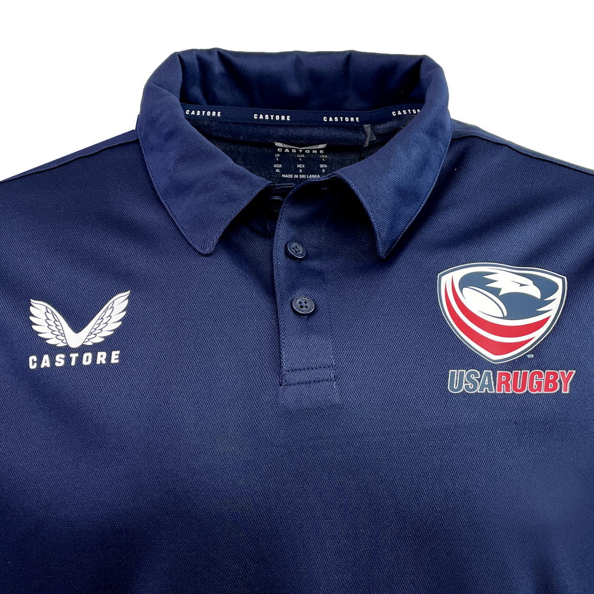 For any Eagles fan, the USA Rugby Polyester Polo by Castore in navy blue features the Castore logo on one side and the USA Rugby emblem on the other.