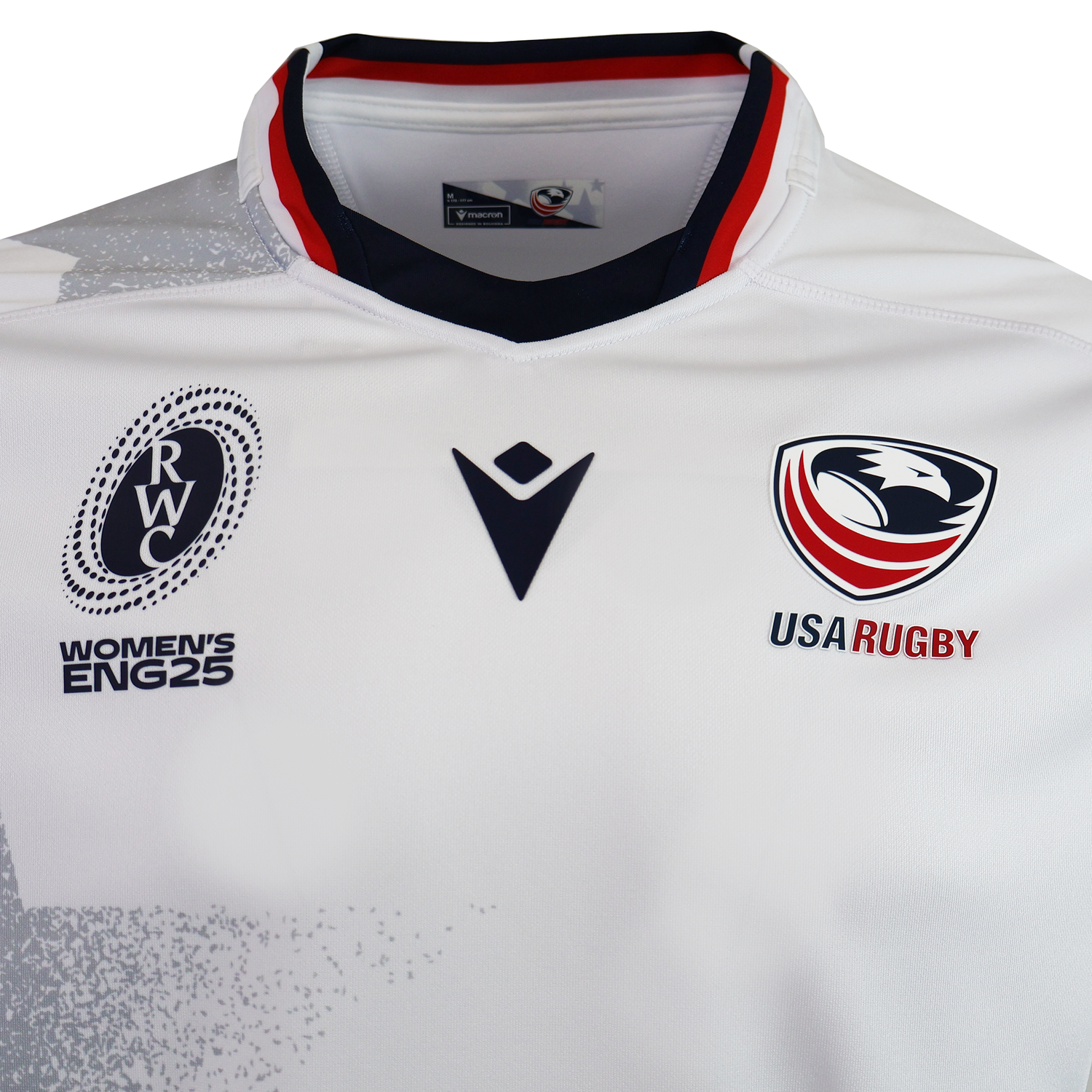 Show your support with the USA Rugby WRWC25 Replica Away Jersey by Macron—a premium white jersey featuring the Women’s Rugby World Cup 2025 logo, USA Rugby eagle emblem, and red, white, and blue collar details.