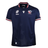 Cheer for Team USA at the Women’s Rugby World Cup 2025 in the Macron USA Rugby WRWC25 Replica Home Jersey, featuring a navy design with red, white, and blue accents, chest logos, and an American flag patch on the sleeve.