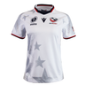 The Women's USA Rugby WRWC25 Replica Away Jersey by Macron features gray star patterns, navy and red collar and sleeve accents, and the USA Rugby logo on the right chest—a stylish replica from Macron.