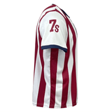 Side view of an Admiral Nations of Rugby United States Sevens Rugby Flag Jersey, reminiscent of an American flag supporter jersey, featuring the number '7' and letter 's' in red on the sleeve, with blue trim on the sleeve edge.
