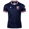 Show your support with the USA Rugby 24/25 Authentic Matchday Home Jersey by Macron—navy blue with white, red, and blue trim, USA Rugby logo, Macron branding, and an American flag patch. Ideal for fans and players alike.
