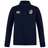 The EMB Canterbury USA Club Shield 1/4 Zip Training Top is a navy quarter-zip featuring the CCC logo and a shield with an American flag on the chest, ideal for rugby season.