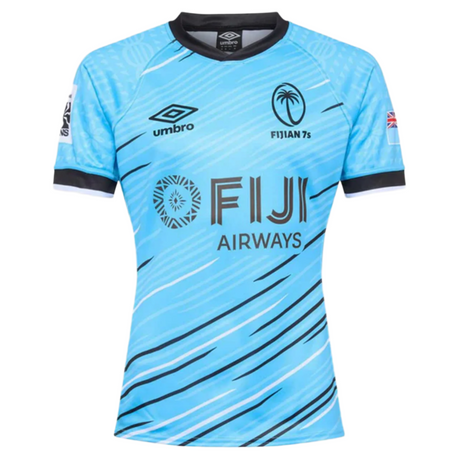 The Fiji 7's 25/26 Replica Away Jersey by Umbro features a light blue design with black collar and sleeve trim, palm logo, and bold blue and black diagonal lines.