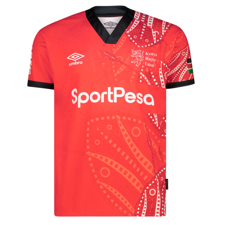 The Kenya 7's 25/26 Replica Home Jersey by Umbro showcases intricate patterns with the iconic Umbro logo and SportPesa sponsorship, celebrating Kenya Sevens rugby with a Kenyan flag on the sleeve.