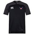 The University of Southern Indiana Women Vapodri Evader Jersey by EMB Canterbury is a black and dark gray short-sleeve jersey with moisture-wicking Vapodri tech, featuring the Canterbury logo on the right chest and a USA Rugby logo on the left.