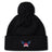 The EMB Canterbury University of Southern Indiana Women Pom Pom Beanie features a black knit design, a top pom-pom, and an embroidered USI wings logo on the front cuff.