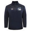 The Play Rugby USA GTS 1/4 Zip Poly Pullover by EMB Gilbert is a navy blue performance top featuring a white “Play Rugby USA” logo on the left chest and a white emblem on the right chest—quality Gilbert rugby apparel perfect for any fan of the game.