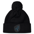 The Uruguay Shield Pom Pom Beanie by EMB Canterbury showcases a stylish black design with a striking blue bird logo on the front, combining fashion and warmth perfectly.