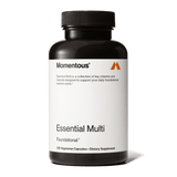 A black bottle labeled "Momentous Multivitamin" by Momentous contains 120 vegetarian capsules, offering daily foundational nutrient support and immune benefits as a dietary supplement.
