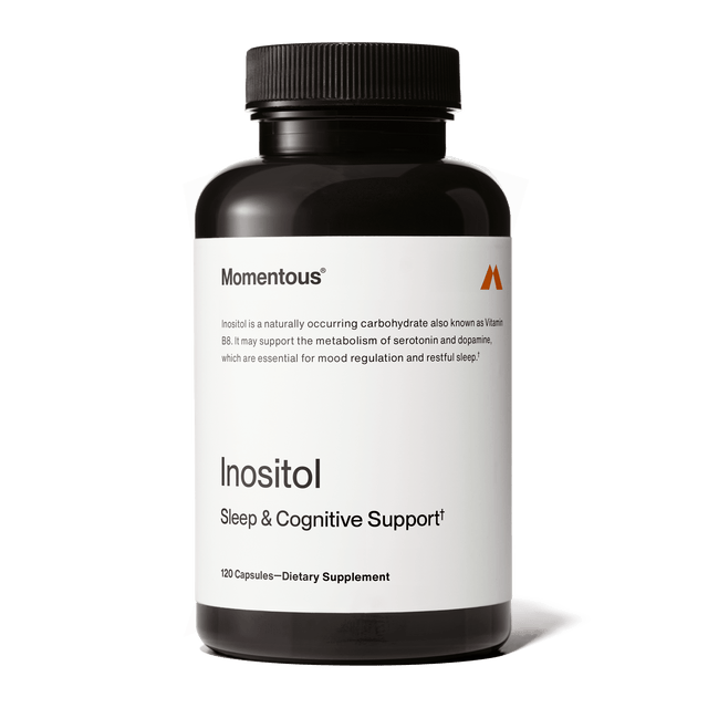 A black bottle of Momentous Inositol by Momentous contains 120 capsules, described as a dietary supplement with inositol for mood regulation and better sleep quality.