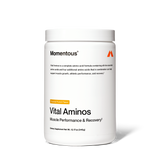 A white container of Momentous Vital Aminos by Momentous, Tropical Punch Flavor, labeled for muscle performance and recovery, contains 12.7 oz (345g) of essential amino acids dietary supplement.