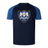 The Villanova Rugby Club Elite Training Tee by WRS Canterbury is a navy blue rugby shirt with blue sleeves, showcasing a large crest. Made from lightweight and durable Vapodri fabric for superior comfort during training.