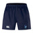The Rugby VA Advantage Short 2.0 by EMB Canterbury features a navy blue design with an elastic waistband, white Canterbury logo on the left leg, Rugby World Cup logo on the right, and is made from recycled materials for eco-friendly comfort.