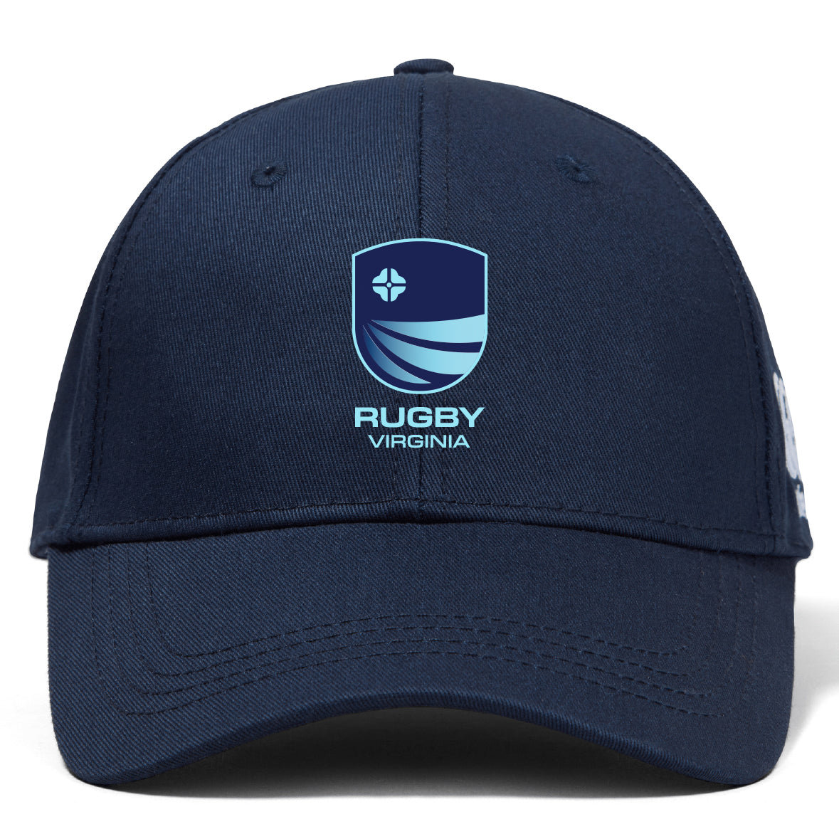 The Rugby VA Flexfit Drill Cap by EMB Canterbury is a navy blue cap with a blue and white shield logo and "RUGBY VIRGINIA" embroidered on the front.